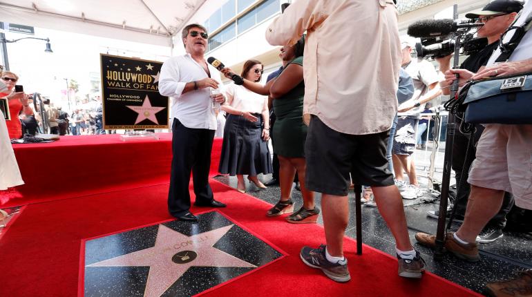 2018-08-22T233302Z_1_LYNXNPEE7L1O2_RTROPTP_4_PEOPLE-SIMON-COWELL-STAR_0.JPG